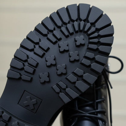 Women’s lug-sole lace-up combat boots with MK logo — Product image: 