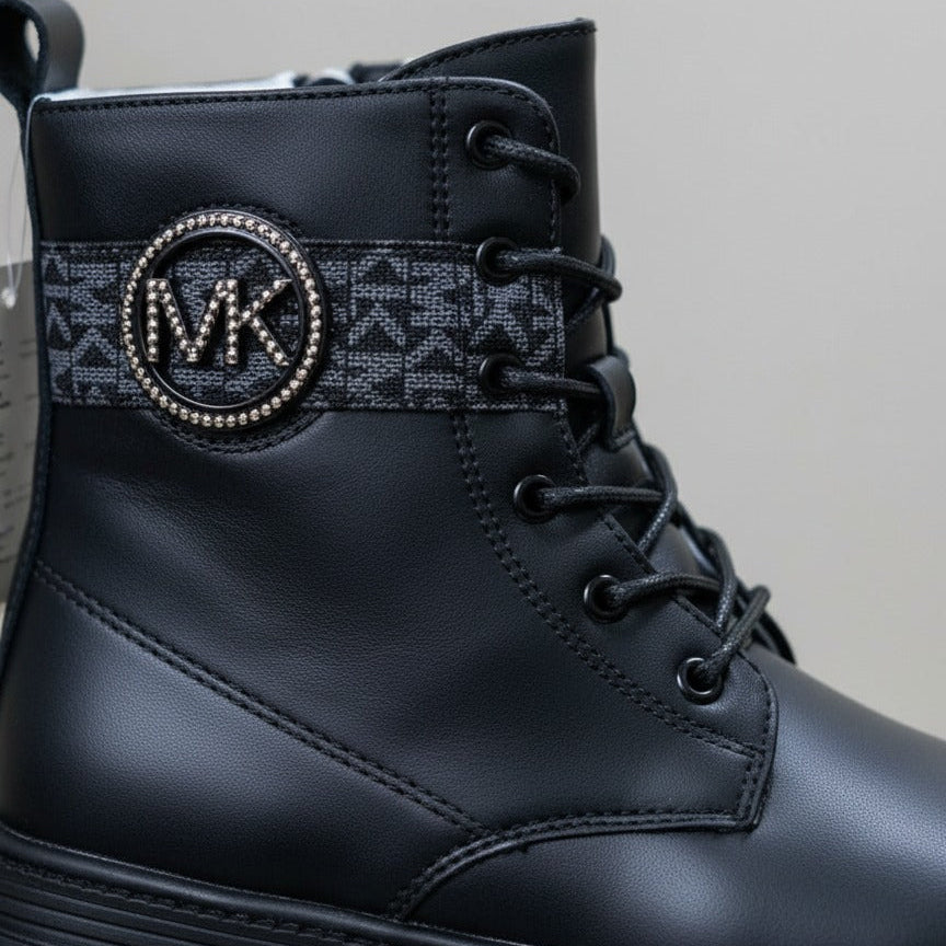Women’s lug-sole lace-up combat boots with MK logo — Product image: 