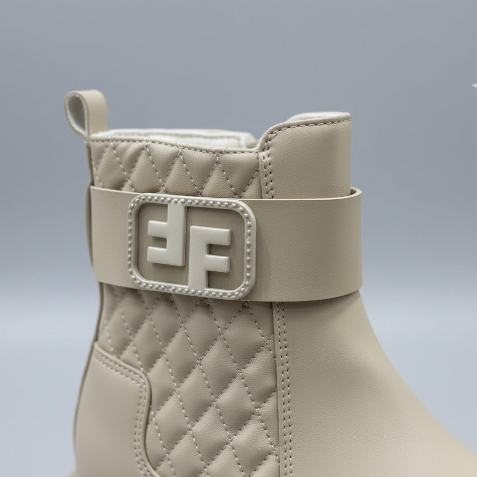Women’s quilted ankle boots with strap and lug sole — Product image: