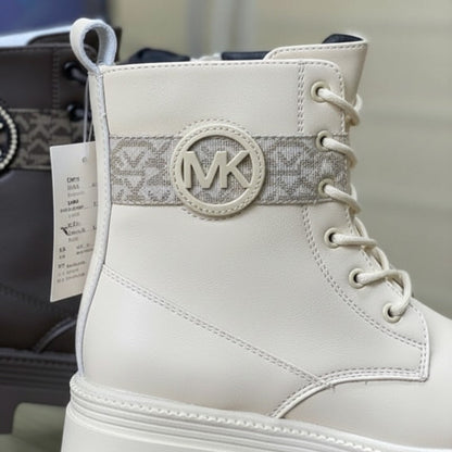 Women’s lug-sole lace-up combat boots with MK logo — Product image: 