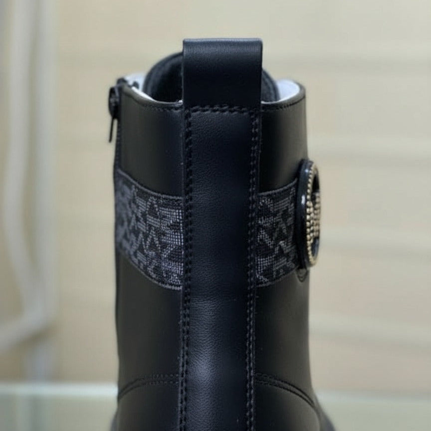 Women’s lug-sole lace-up combat boots with MK logo — Product image: 