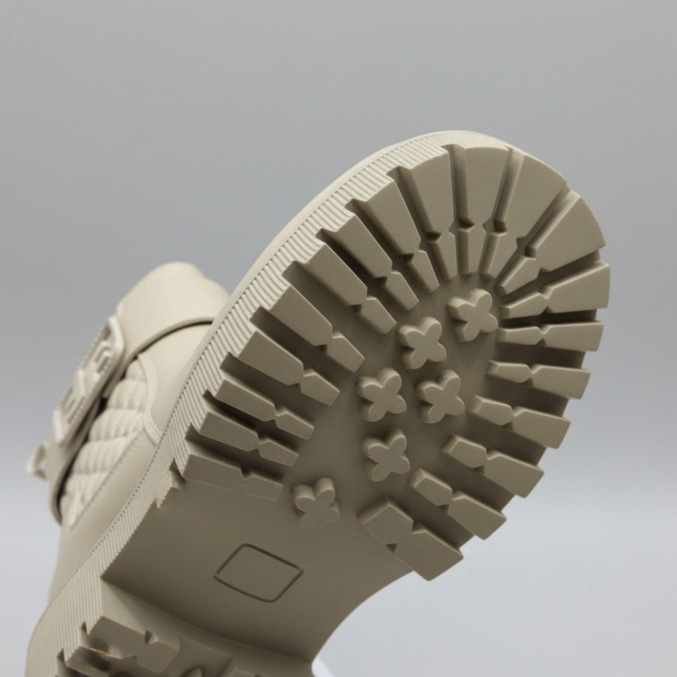 Women’s quilted ankle boots with strap and lug sole — Product image: