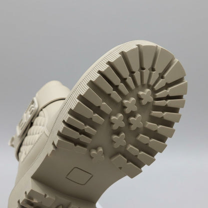 Women’s quilted ankle boots with strap and lug sole — Product image: